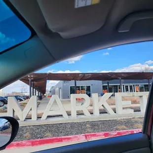 a view of the sign from inside a car