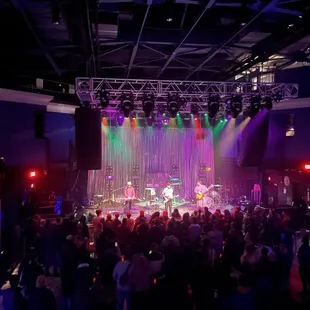 a large group of people on stage