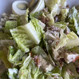 Cobb salad with an over cooked hard boiled egg