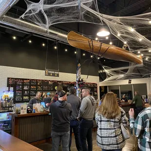 a crowd of people standing in line