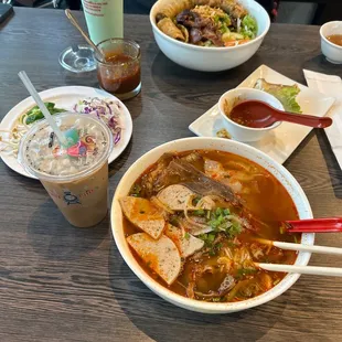 Spicy noodle soup bowl, rice noodle bowl, coffee and boba slush.