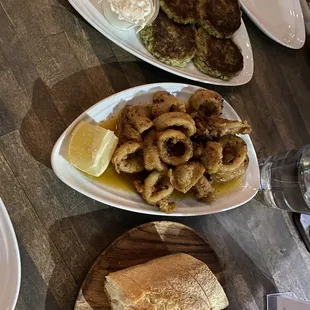 Zuccini cakes and sautéed calamari