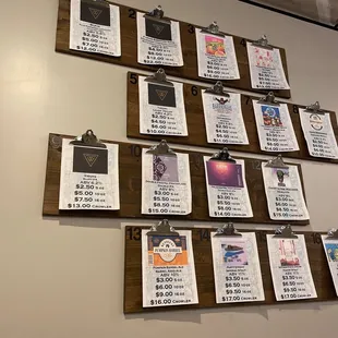 a wall with a bunch of posters on it