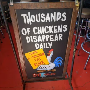 a sign for thousands of chickens disappear daily