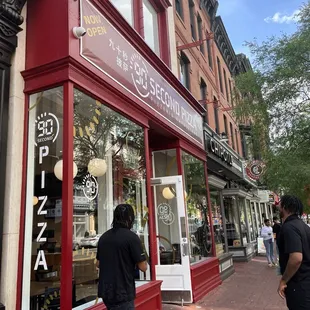 Not a very good first impression. Anytime a business has their door open. It means they're most likely NOT running the AC.