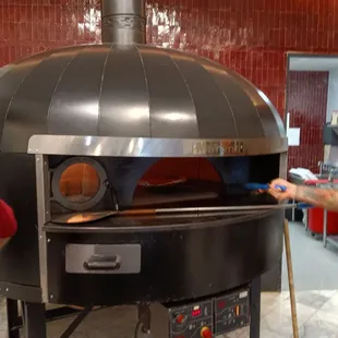 two people in a kitchen