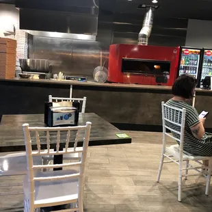 a woman sitting at a table