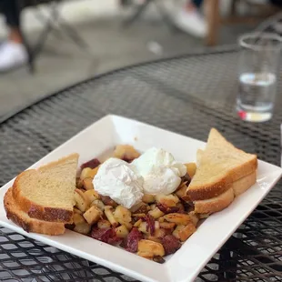 Breakfast (two eggs any style w/ bacon, hash and toast)