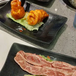 List top to bottom: pineapple, spicy beef bulgogi, spicy pork belly, short rib
