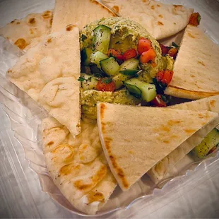 Pita and hummus side.