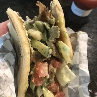 Look at all those delicious veggies and sauce.  A 5 star gyro for sure.