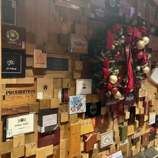 a wall of christmas decorations