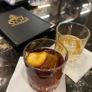 two cocktails on a table