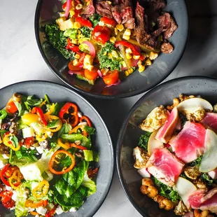 &quot;Mykonos salad,&quot; (right) &quot;Steak salad,&quot; (center) &quot;Bumpy salad&quot; (left)