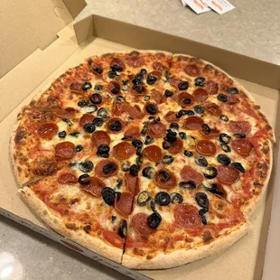pepperoni, olives, and cheese