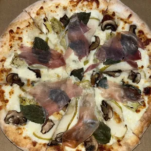 a pizza in a pizza box