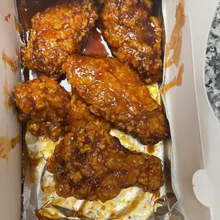 chicken in a box with sauce