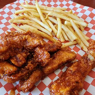 Lunch Special $11.99. 5 tenders, fries, and a drink. Spicy sauce is what I got.