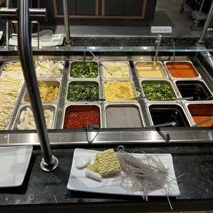 a buffet with a variety of food items