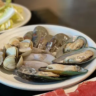 Mussels, clams, shrimp, and baby octopus.