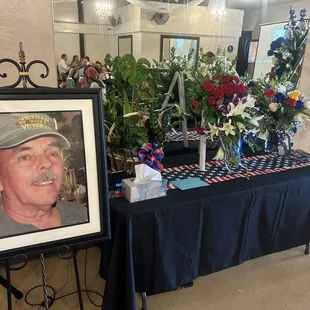 My sweet dad and flowers displayed at the center