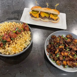 Gouda Mac &amp; Cheese with bacon wrapped quail, sliders &amp; honey balsamic glazed Brussel sprouts