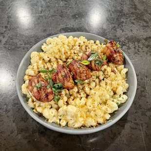 Gouda Mac &amp; cheese with bacon wrapped quail