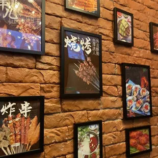 a brick wall full of asian food