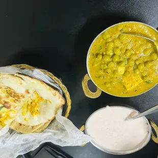 Matar paneer raita and garlic naan