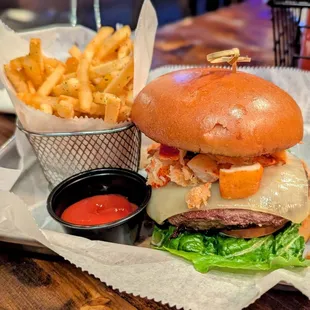 December 31, 2024; Lobster and Gruyere Burger ($24).