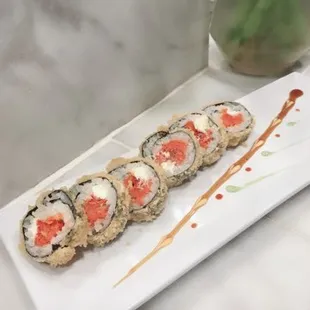 a plate of sushi on a table
