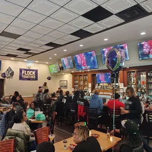 Sports Bar, plenty of tv's food and fun.  Baltimore Orioles games. Ravens fans love