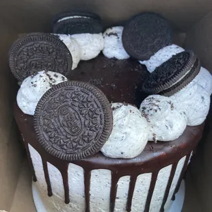a cake with oreo cookies on top