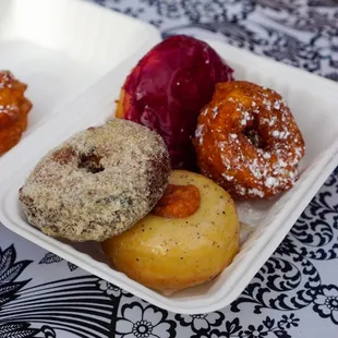 French Cruller, Cranberry Cake Donut, Filled Brioche Thumbprint, and Candied Ginger-Pear Fritter - IG: @nelson_eats