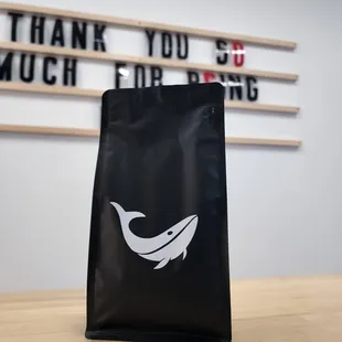 a bag of coffee on a table