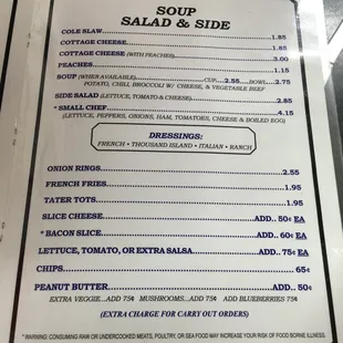 a menu for a salad and side