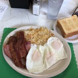 bacon, eggs, hash browns and toast