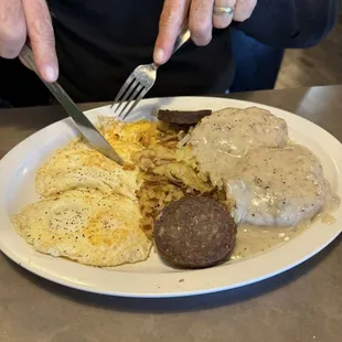 "Over medium" eggs and hockey puck sausage
