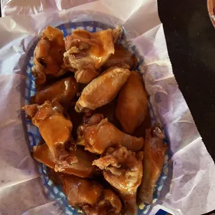 A dozen hot &amp; naked bone in wings.  Love em'