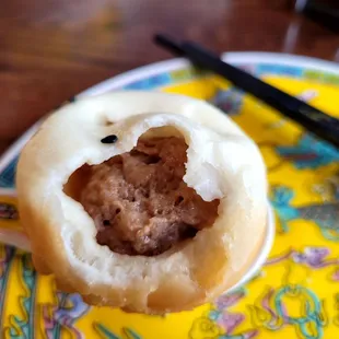 Inside the pan fried pork soup dumpling. Good ratio of filling to wrapper and soup inside.