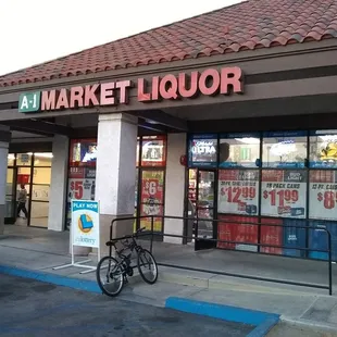 a bicycle parked in front of the store