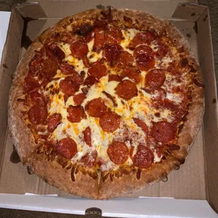 a pepperoni pizza in a box