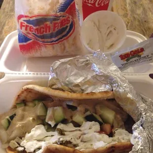 Falafel sandwich combo. Comes with French fries and a soda. I also asked for a side of tzatziki "sauce."