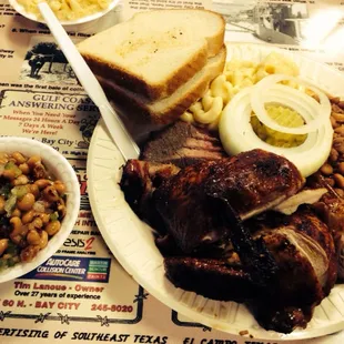 Half chicken, brisket, and sides. Finger licking good, y&apos;all!