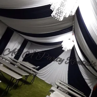 Black and white drapping on a 20x40 canopy