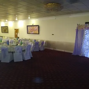 a banquet room decorated for a wedding