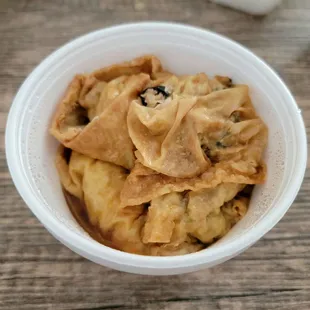 Bean Curd Roll in Oyster Sauce. Sorry, it looks contorted in the togo container.