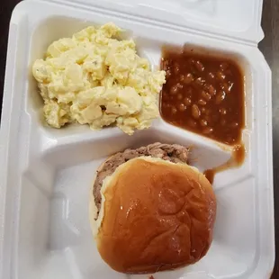 Pork sandwich plate w baked beans and potato salad