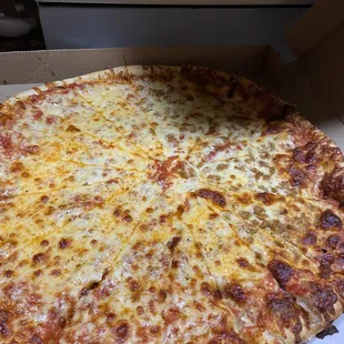 a cheese pizza in a box