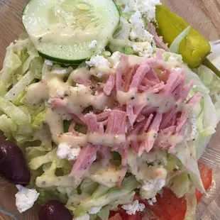 Greek side salad with entrée is an option.  Great Greek dressing
